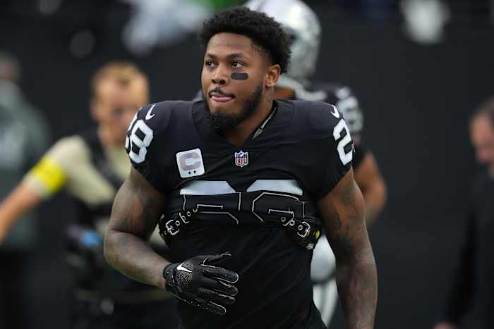 Jan 1, 2023; Paradise, Nevada, USA; Las Vegas Raiders running back Josh Jacobs (28) takes the field before the start of a game against the San Francisco 49ers at Allegiant Stadium. Mandatory Credit: Stephen R. Sylvanie-USA TODAY Sports
